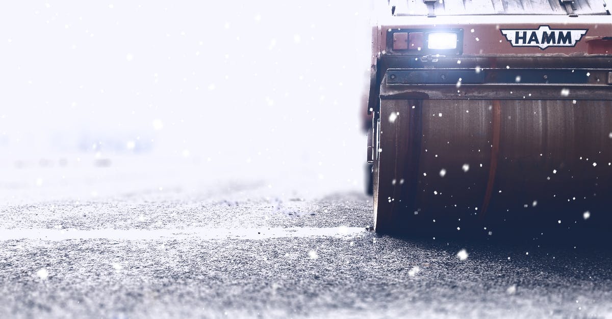 Definition for light, medium and heavy flour? - Brown Hamm Road Roller on Paved Road