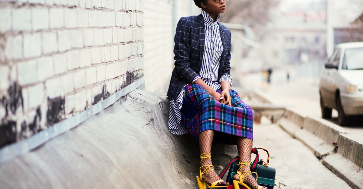 Defrosting Fish without Bag - Woman Sitting of Concrete Stair Near Gray Car