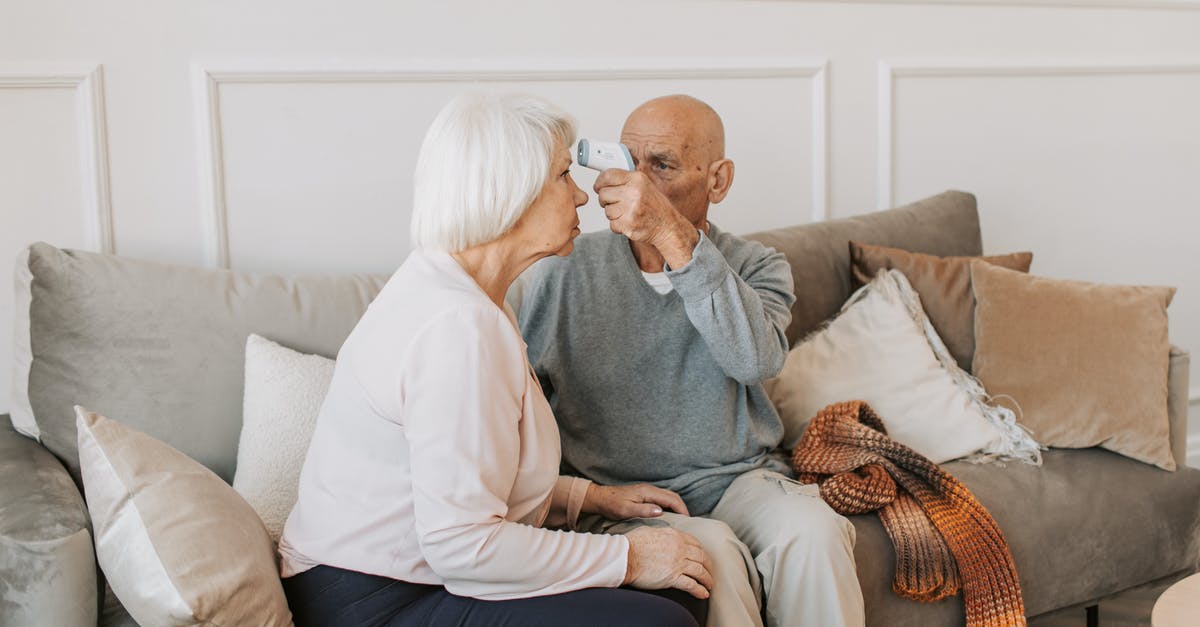 Dehydration temperatures for long-term preservation - Man and Woman Sitting on Sofa 