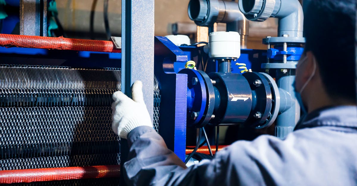 Delayed Pressure Canning by 12 hours? OK? or no? - Person in White Long Sleeve Shirt Using Blue and Silver Industrial Machine Delayed Pressure Canning by 12 hours? OK? or no? - Person in White Long Sleeve Shirt Using Blue and Silver Industrial Machine