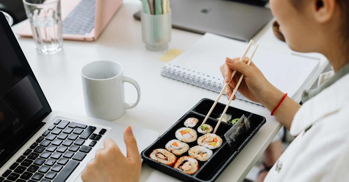 de-parasiting mackerel for sushi - Person Holding Chopsticks on White Ceramic Plate