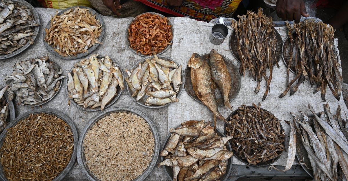 Desalinating dried/smoked fish - Photo of sea food