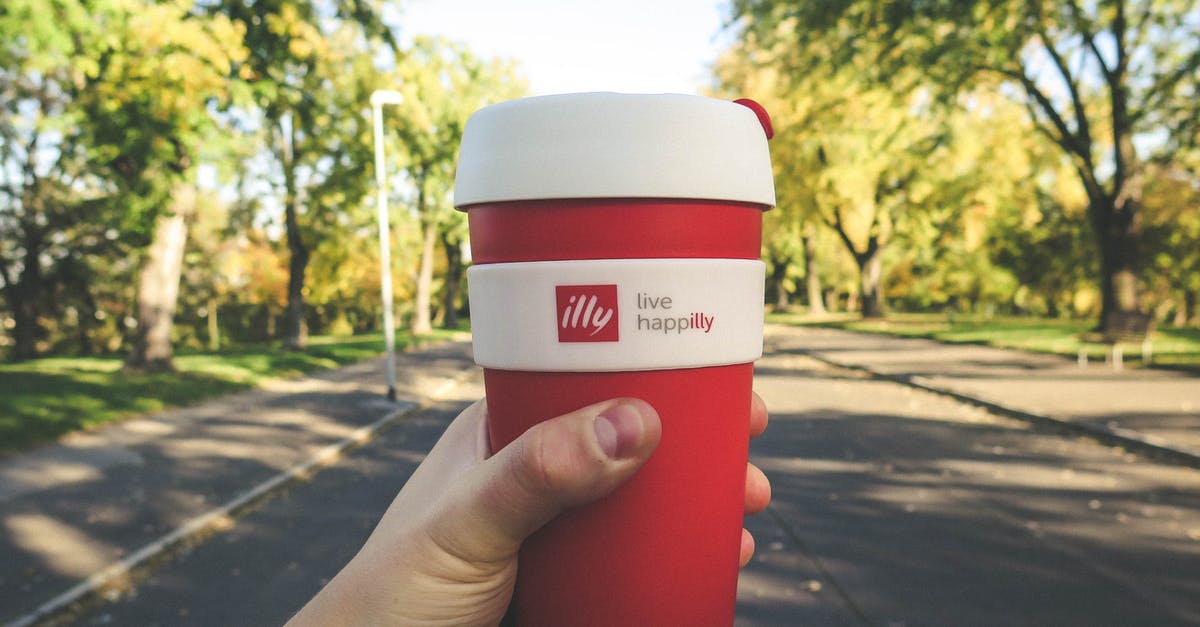 Describing the taste of Illy coffee and similar brands - Red and White Plastic Tumbler