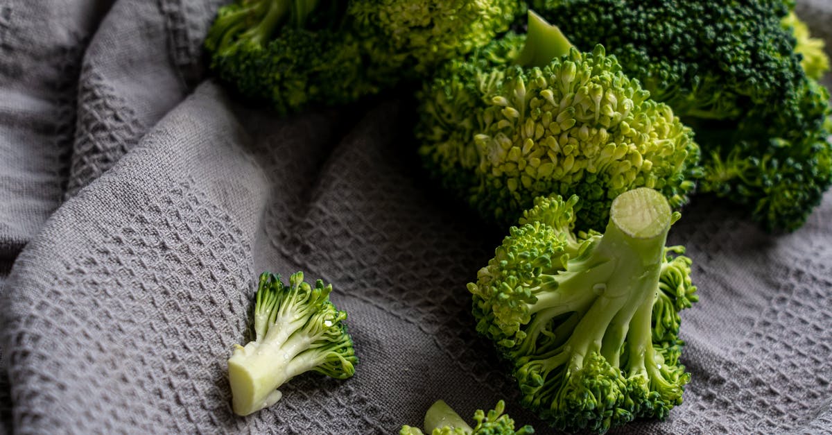 Difference between boiling and steaming vegetables? - Green Broccoli on White Textile