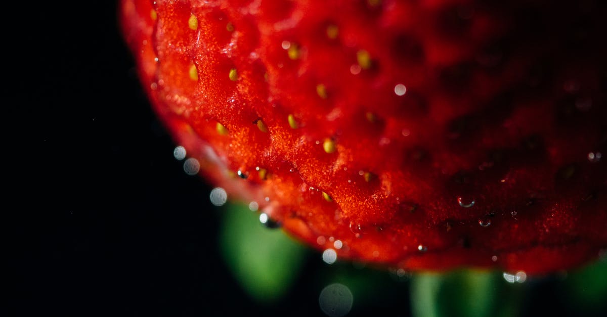 differences in caper berry seeds - Selective Focus Photography of Red Petaled Flower