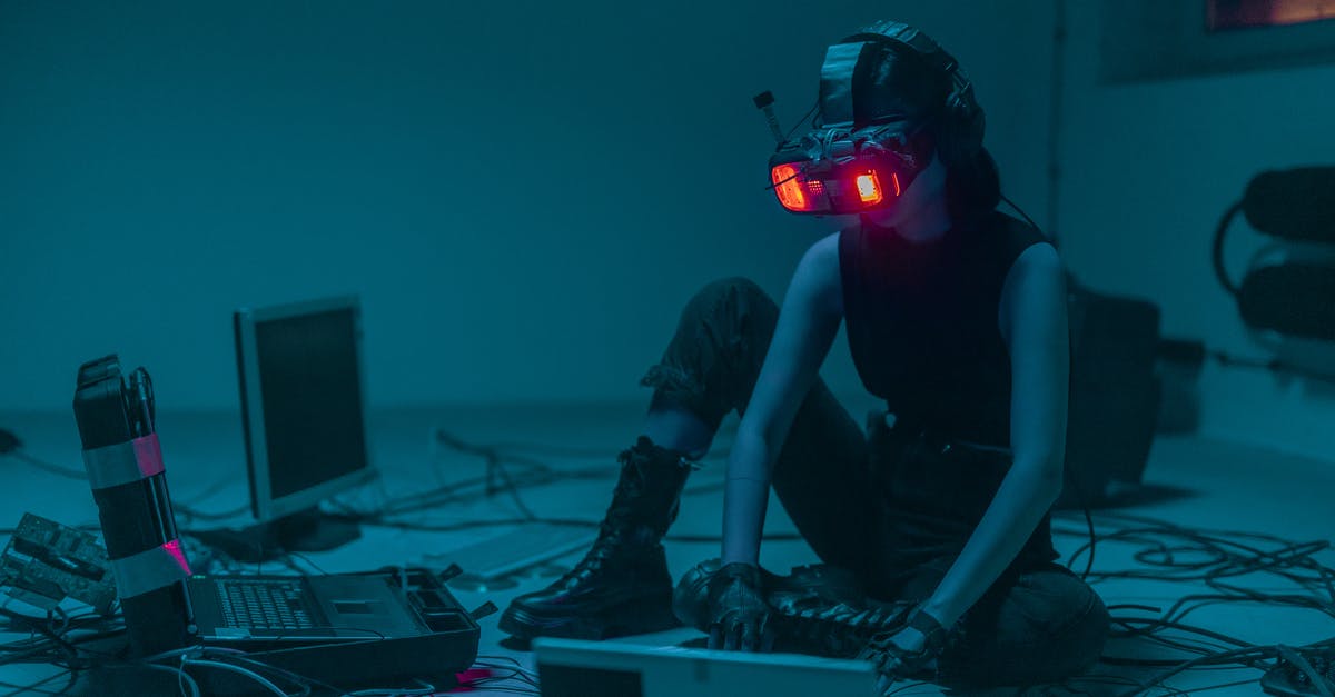 Digital recipes storage? [closed] - A Person Sitting on the Floor with Vr Goggles Using a Computer