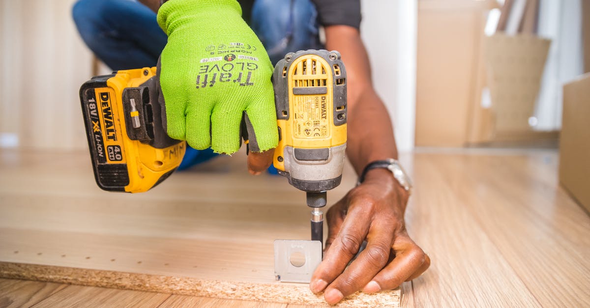 DIY Masa Harina - Person Using Dewalt Cordless Impact Driver on Brown Board