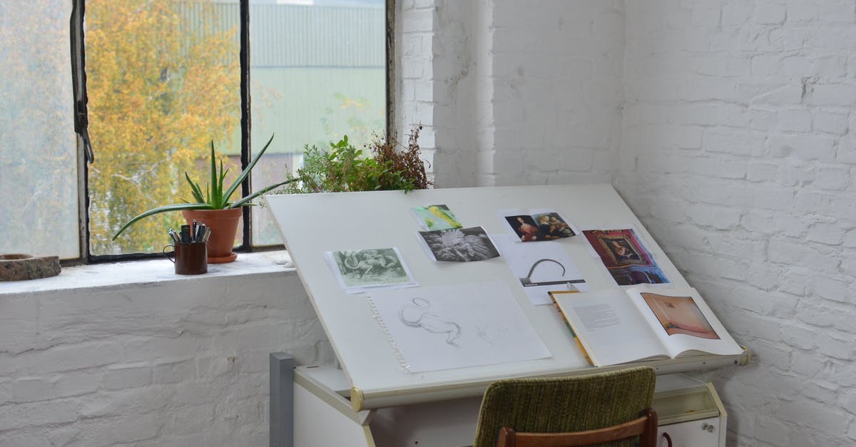 DIY Pot Noodle safe ingredients - Opened books with various pictures and sketch placed on drawing table near window in workshop