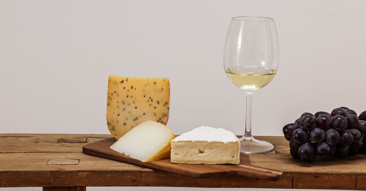 Do all cheeses change their taste during their shelf life, like Brie or Camembert? - Clear Wine Glass Beside Bread on Brown Wooden Chopping Board Do all cheeses change their taste during their shelf life, like Brie or Camembert? - Clear Wine Glass Beside Bread on Brown Wooden Chopping Board