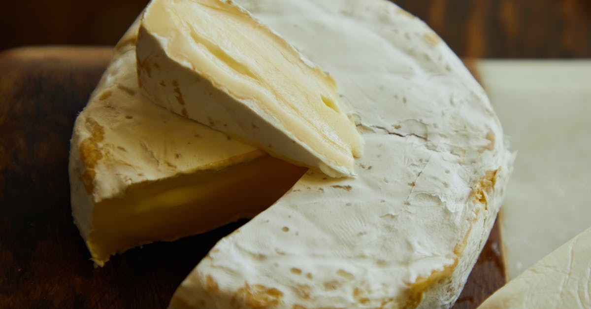 Do all cheeses change their taste during their shelf life, like Brie or Camembert? - Sliced Cheese on Brown Wooden Table Do all cheeses change their taste during their shelf life, like Brie or Camembert? - Sliced Cheese on Brown Wooden Table
