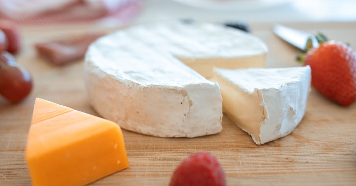 Do all cheeses change their taste during their shelf life, like Brie or Camembert? - Sliced Cheese on Brown Wooden Table Do all cheeses change their taste during their shelf life, like Brie or Camembert? - Sliced Cheese on Brown Wooden Table