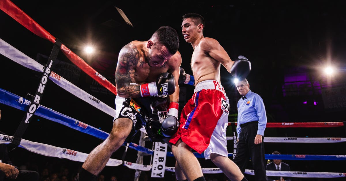 Do all yogurts have live active cultures? - Low-Angle Photo of Two Men Fighting in Boxing Ring