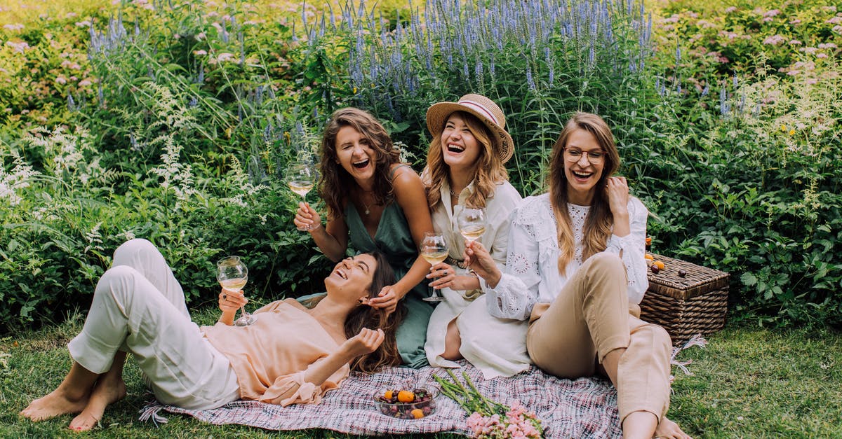 Do beignets have to sit overnight? - Women Sitting on Green Grass Field