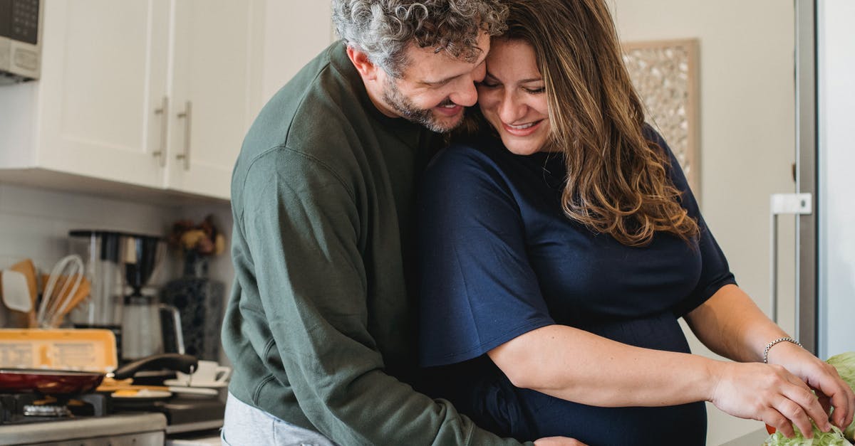 Do burgers cook better when close or far apart? - Romantic couple preparing breakfast together