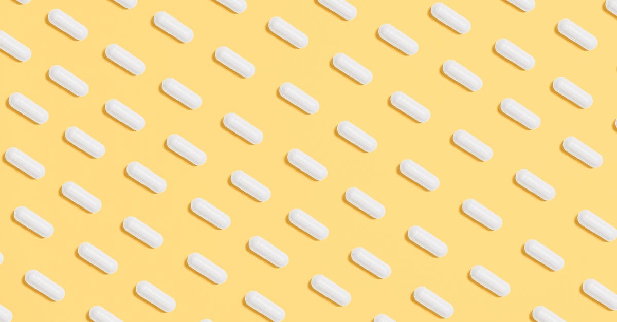 Do centrifugal juicers destroy vitamins through friction? - White Capsules on Yellow Background