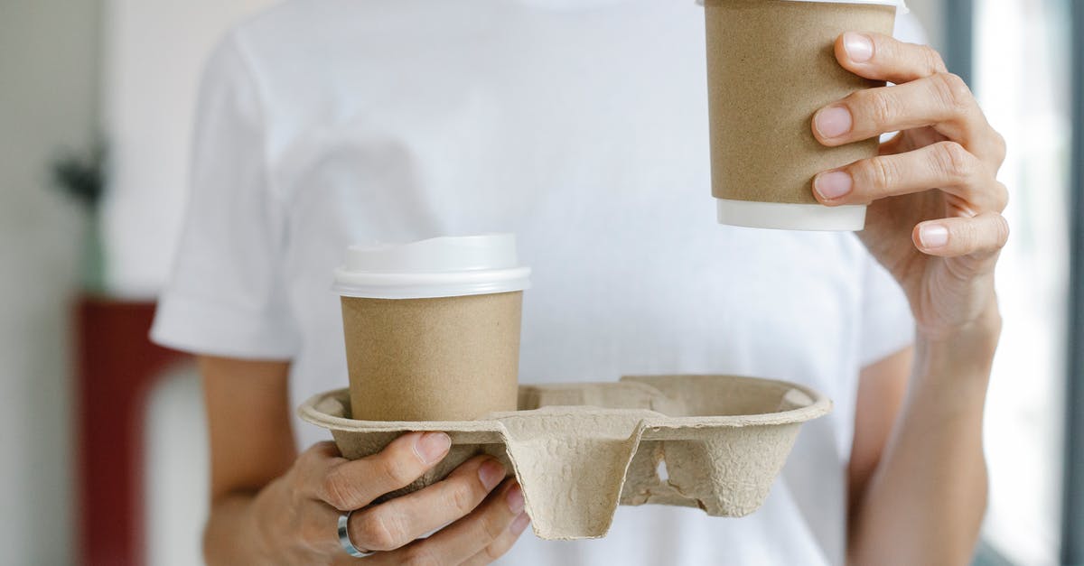 Do coffee and tea need to be agitated while brewing? - Crop female enjoying takeaway coffee