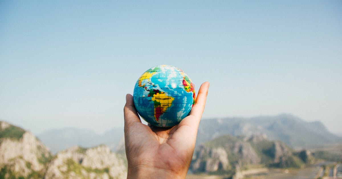 Do gel spheres hold up to heat? - Person Holding World Globe Facing Mountain