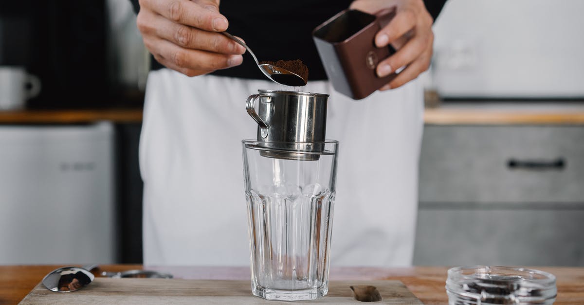 Do I need to let wine breathe if I'm cooking with it? - Person Holding Silver Cup and Silver Iphone 6 Do I need to let wine breathe if I'm cooking with it? - Person Holding Silver Cup and Silver Iphone 6