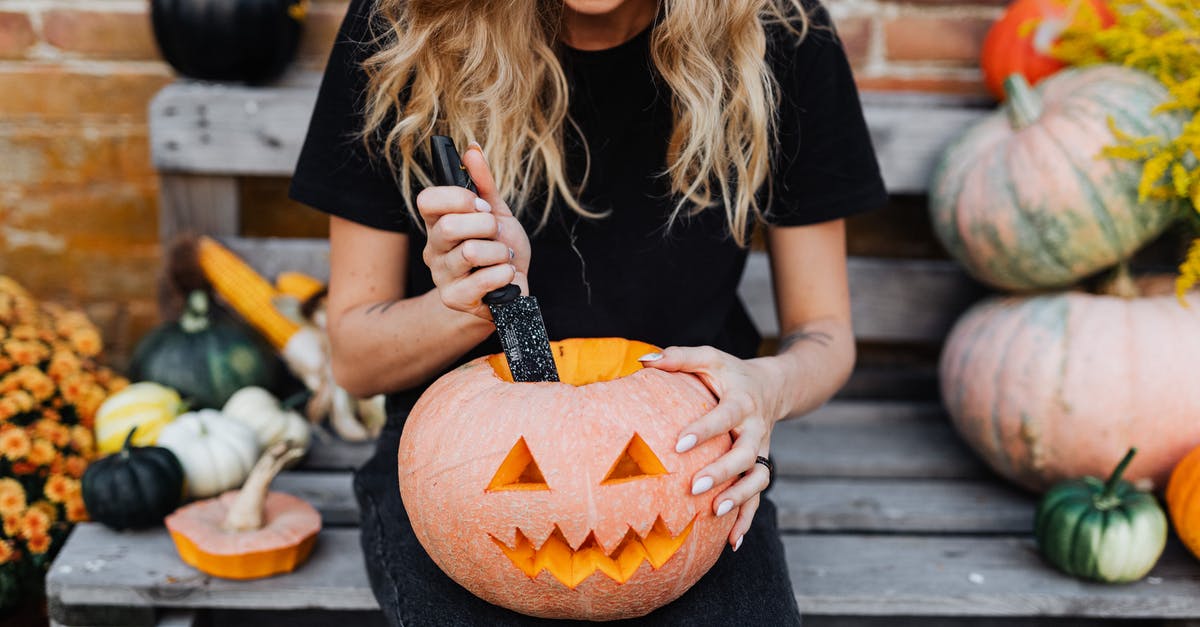 Do nettles grow in Florida? - Woman in Black T-shirt Holding Jack O Lantern