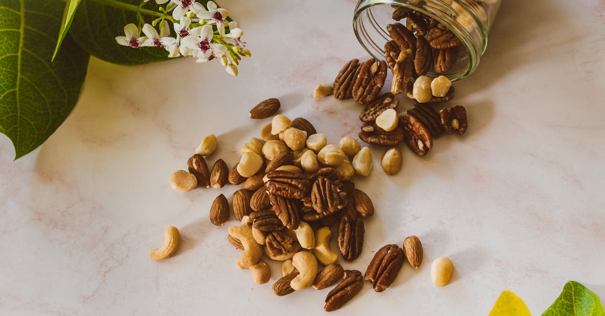 Do nuts ever go bad? - Brown and Beige Nuts on White Table