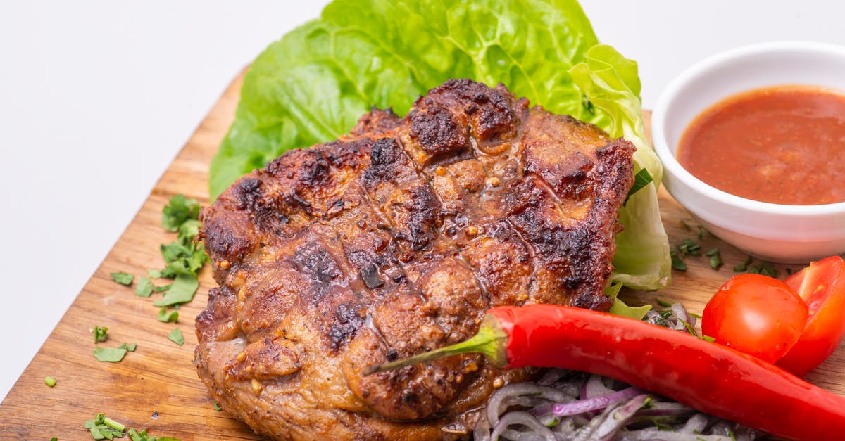 Do onions help to sweeten tomato sauce? - A Delicious Fried Meat in Close-up Shot