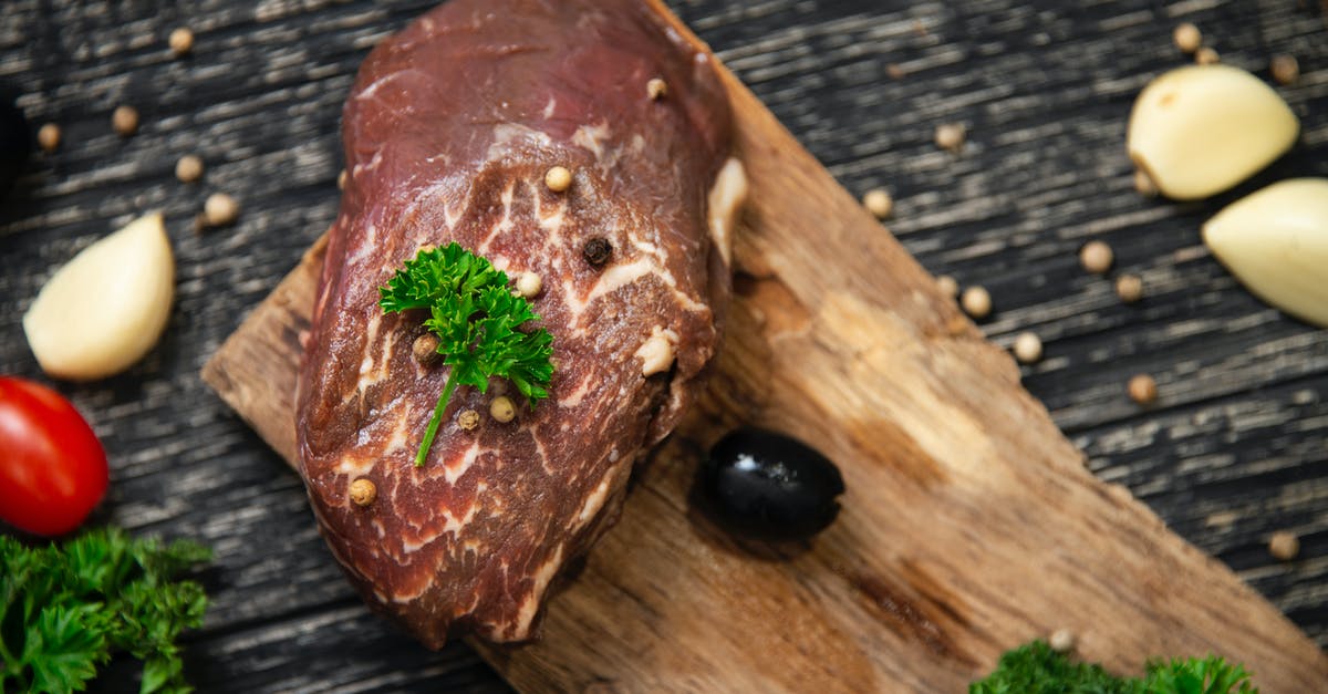 Do other ingredients in brines penetrate the meat? - Raw Meat on Brown Wooden Chopping Board
