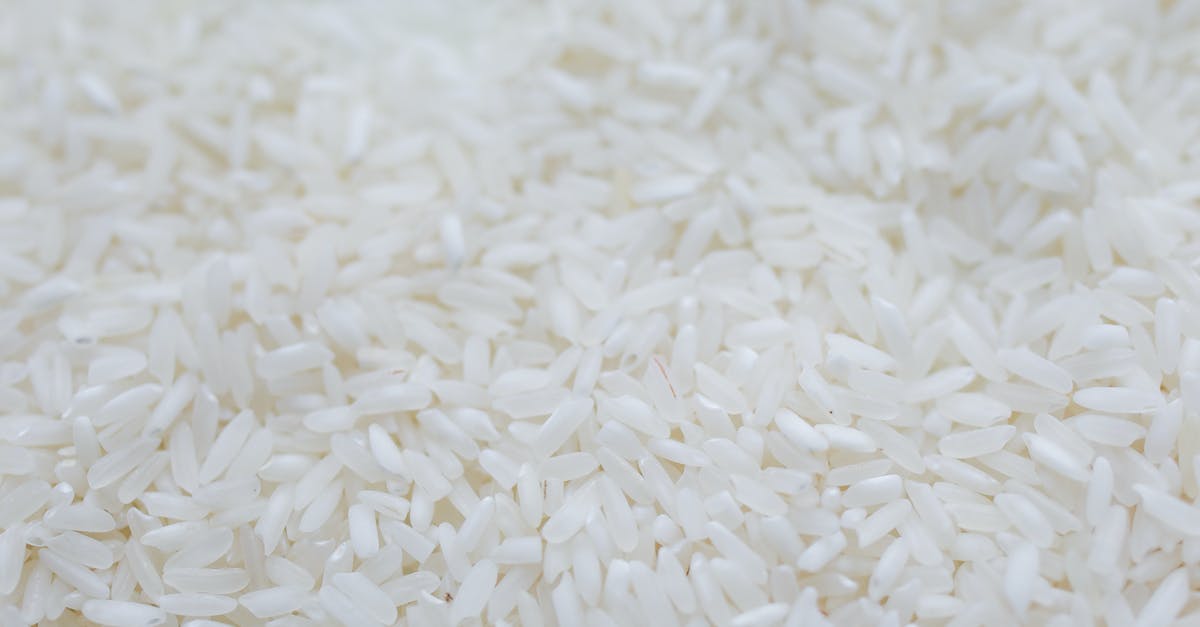 Do potatoes and rice lose significant amount of fiber when overcooked? - Close-Up Photo Of White Rice Grains