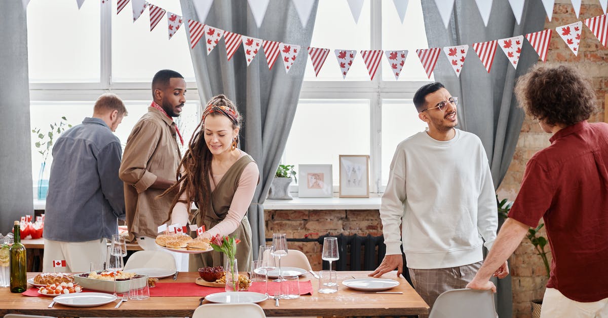 Do tinned foods go off (stale)? - Group of People Having a Holiday Party