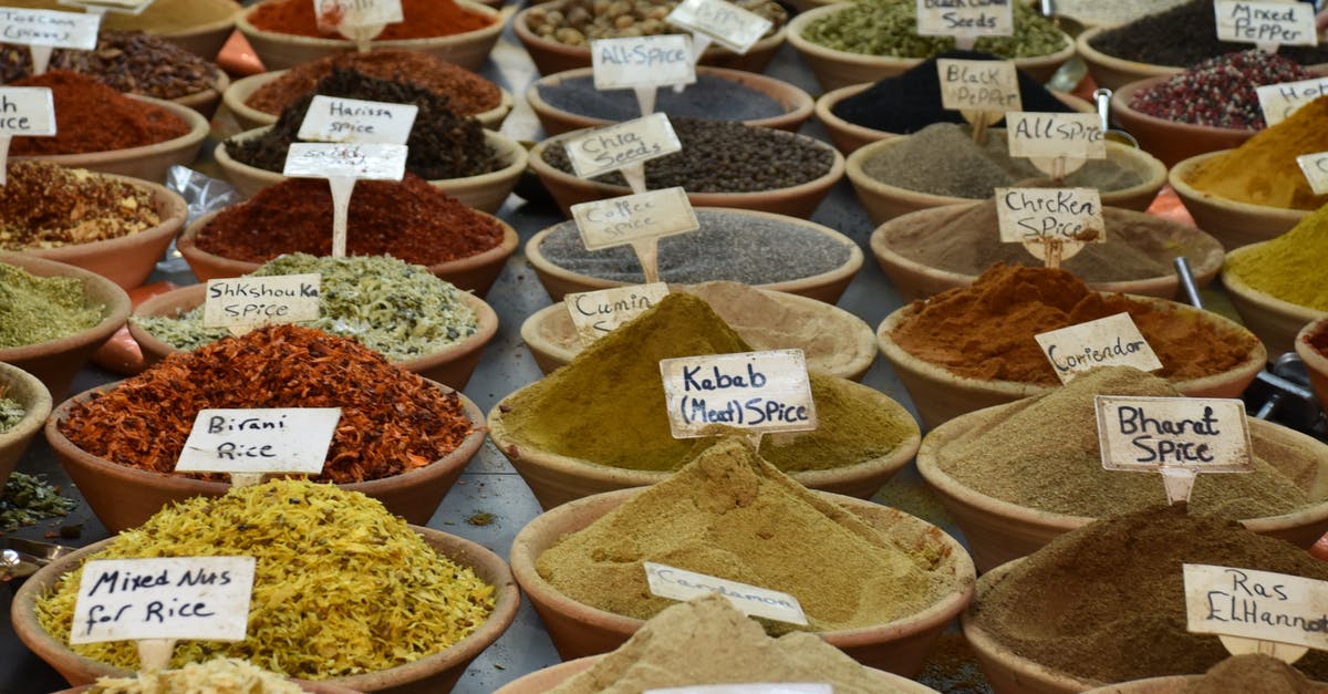 Do you use paper or cloth towel for patting a meat dry before frying? - Collection of dry oriental spices in street bazaar