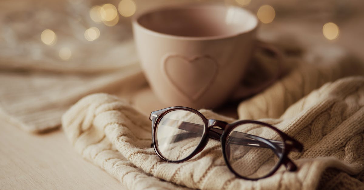 Does a stovetop warming element obviate the need for a slow cooker? - Eyeglasses with mug on warm scarf
