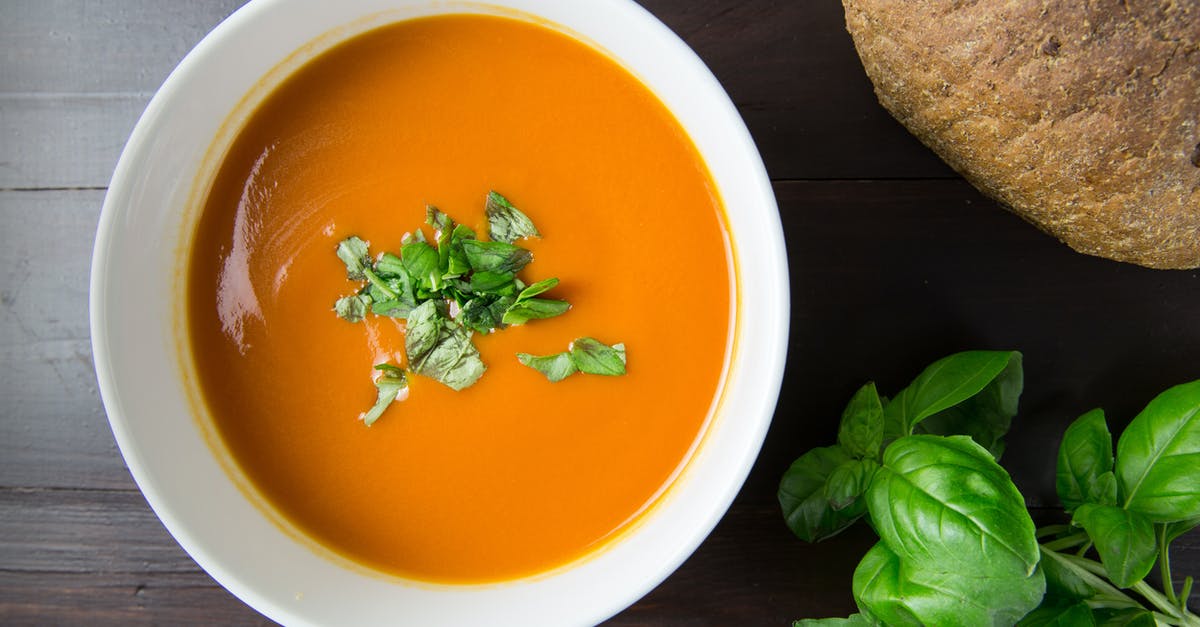 Does adding vinegar to soup make it spoil faster? - Brown Soup in White Ceramic Bowl