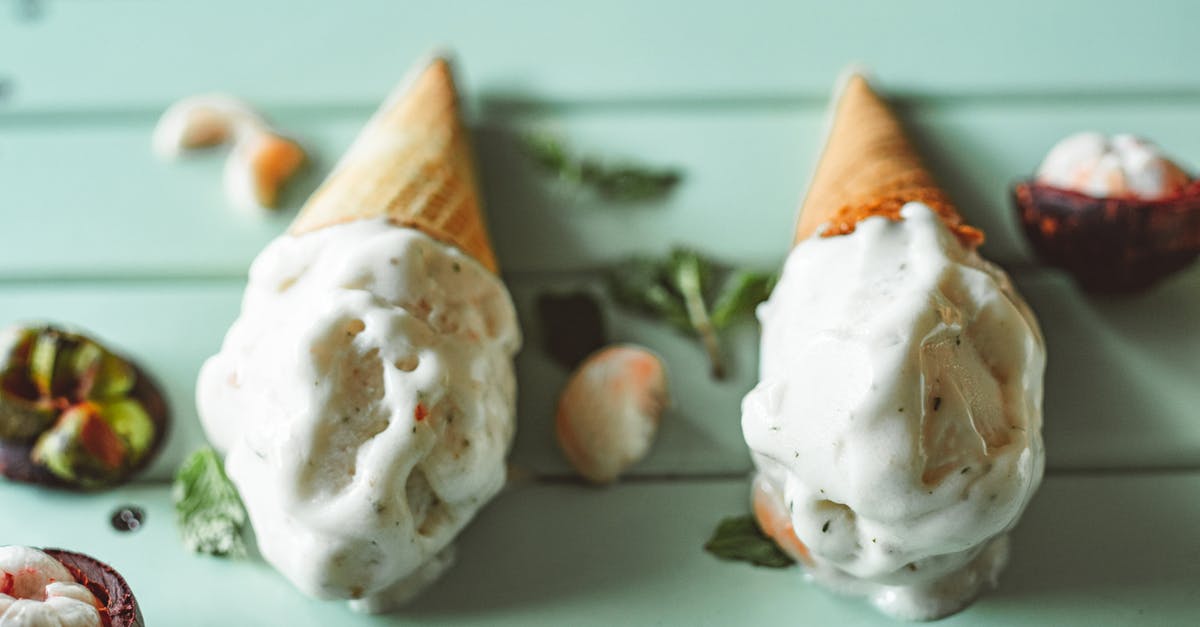 Does anyone know these candy - White Ice Cream on Blue Ceramic Plate