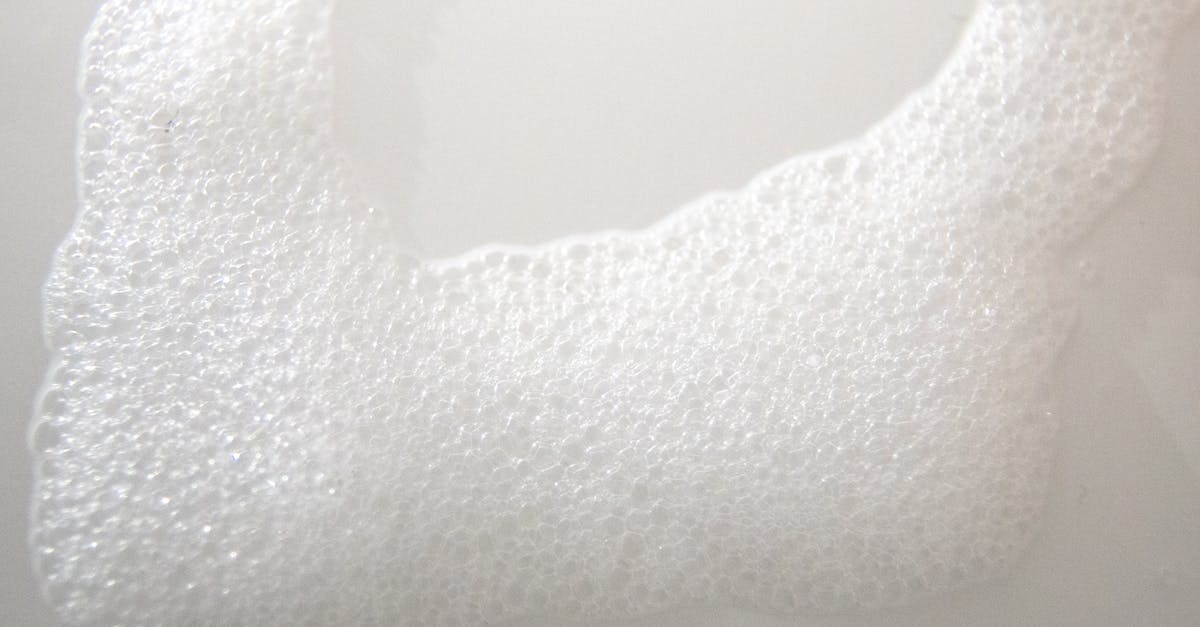 Does bubbly froth mean my vinegar batch needs trashed? - Abstract background of white foam on smooth surface