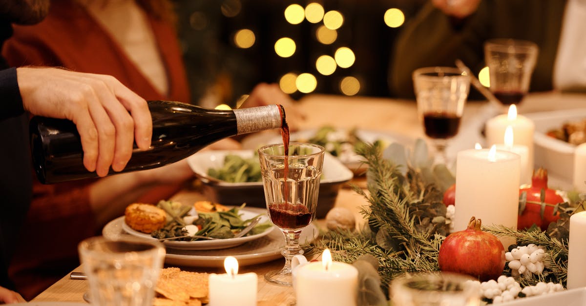 Does food get spoilt if it catches moisture? - Person Pouring Wine on Glass