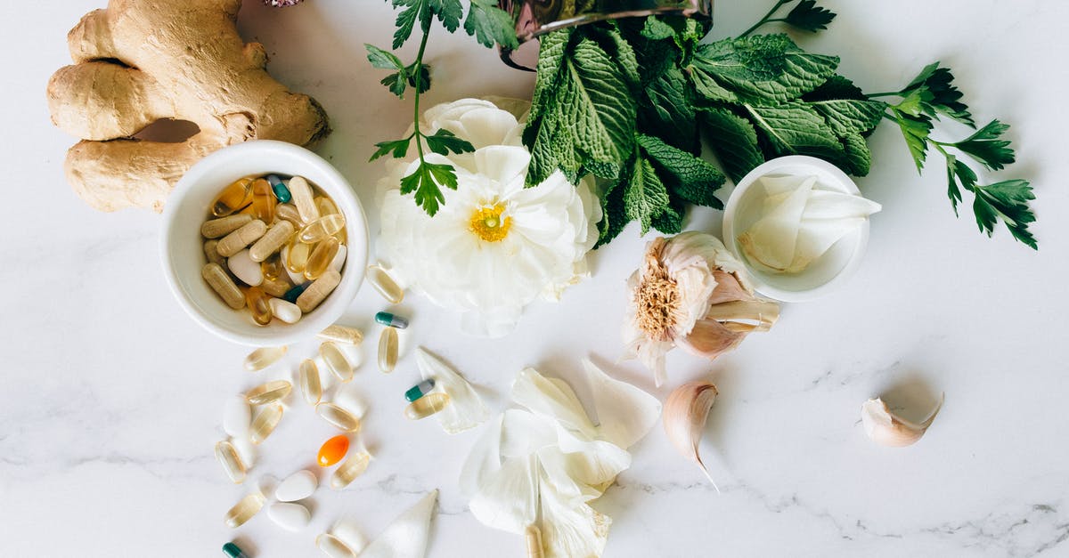 Does fresh garlic have any specialized uses? - Flat Lay Photo of Alternative Medicines