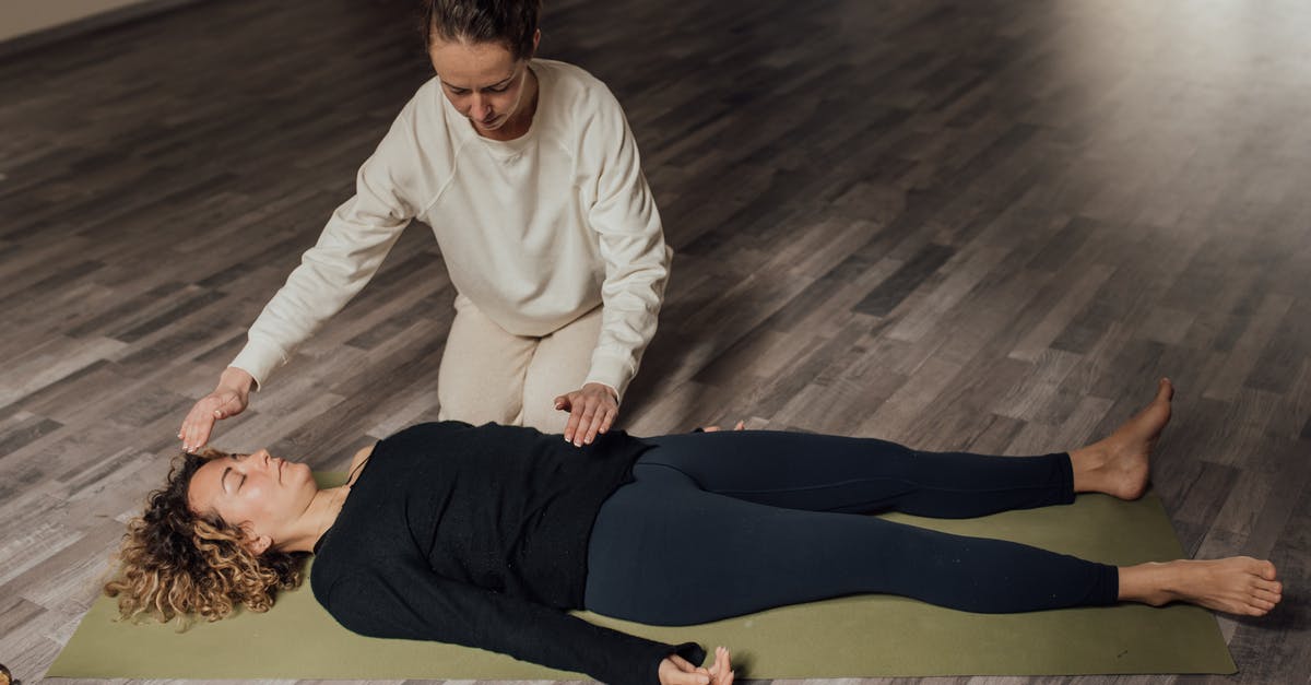 Does keeping a fridge/freezer full significantly help energy efficiency? - Energy practitioner healing relaxed woman on yoga mat