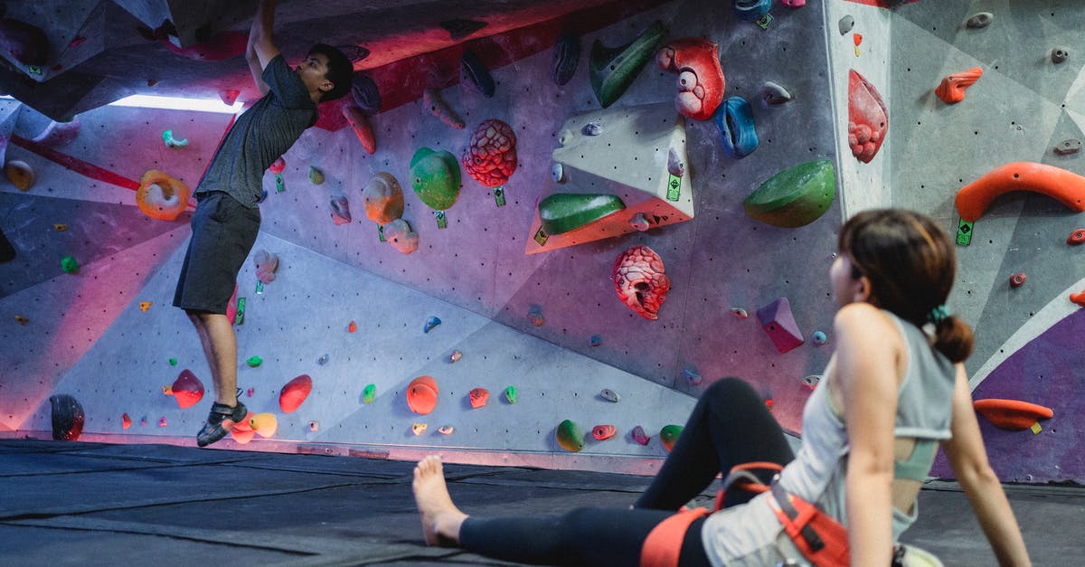 Does keeping a fridge/freezer full significantly help energy efficiency? - Asian man in climbing gym with girlfriend