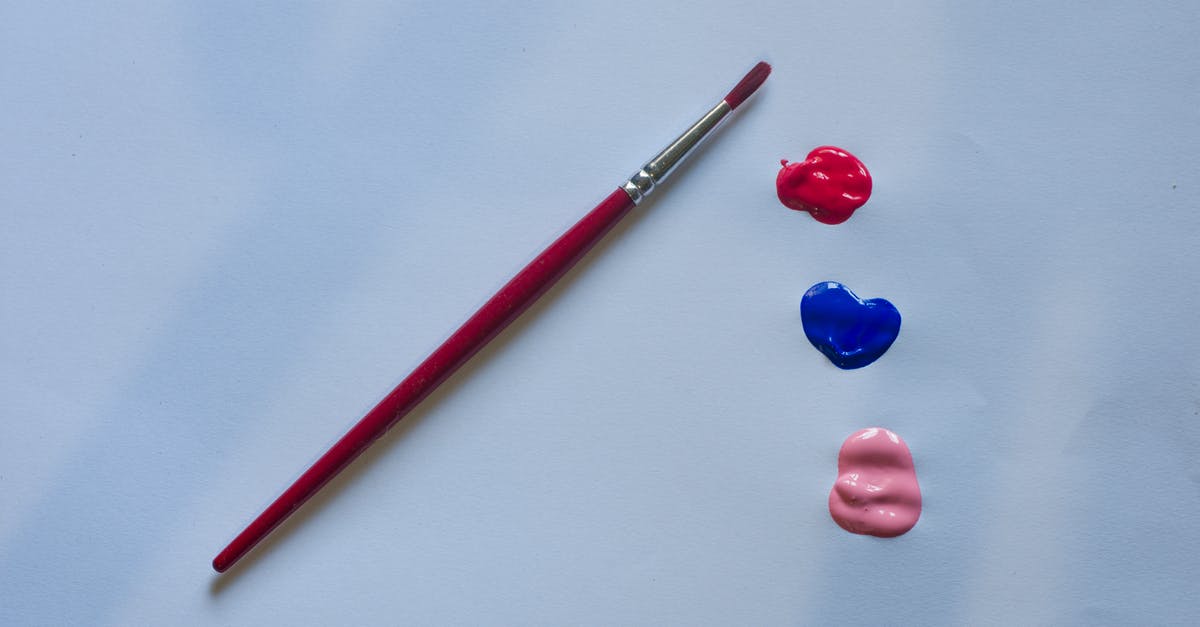 Does oil oxidation create trans fats? - Drops of colorful paints on white surface near brush