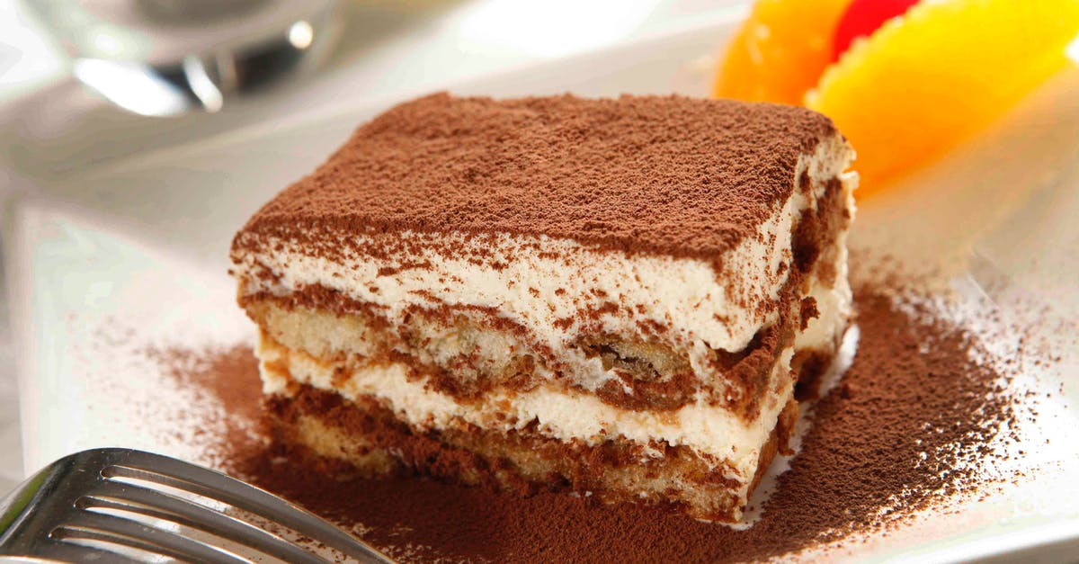 Does tiramisu firm up in the fridge? - Close Up Shot of a Sliced Cake