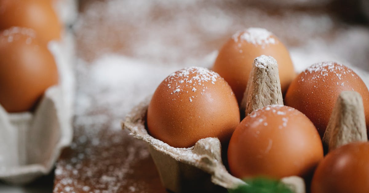 Does unopened whole wheat flour have to be refrigerated? [duplicate] - Eggs in carton container on table with flour