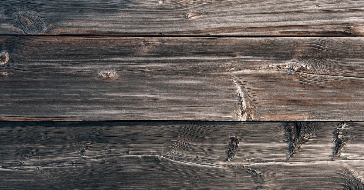 Doogh/Ayran from scratch - From above texture of aged shabby wooden table made of natural lumber panels as abstract background