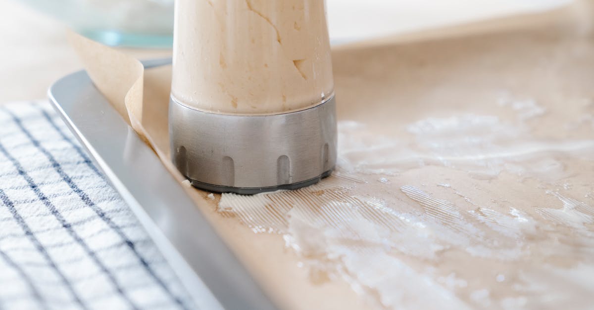 Dough getting into handheld mixer - A Dough Made Using a mixer