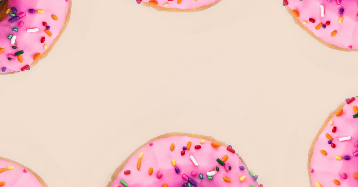 Doughnuts preseratives - Close-Up Photo of Pink Donuts