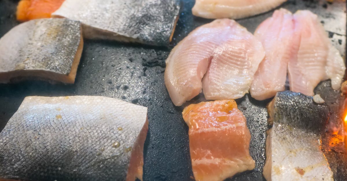 Dried and Salted Fish Fillets (e.g. cod) Sous Vide - A Selection of Fresh Fish Fillets on a Griddle