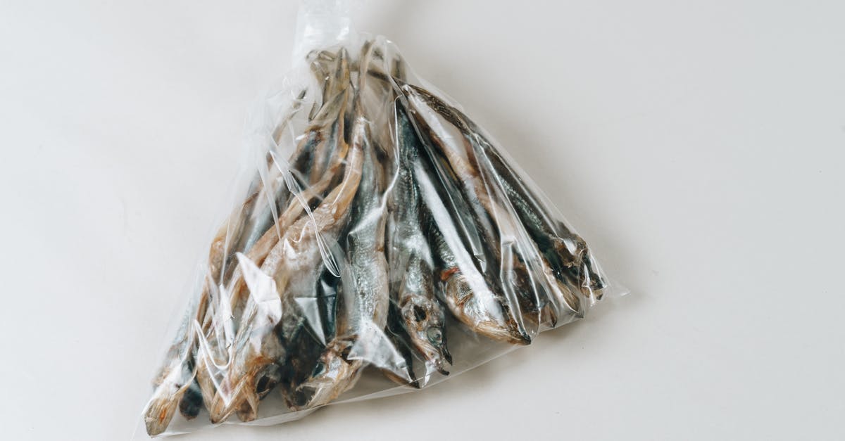 Dried and Salted Fish Fillets (e.g. cod) Sous Vide - Salted Dried Fishes in a Plastic Packed
