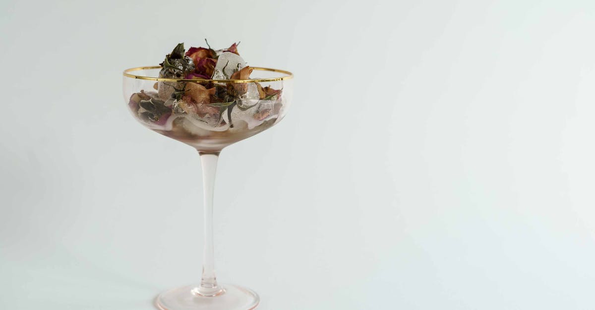 Dried apricots smell of alcohol? - Glass of melting ice with dried flowers