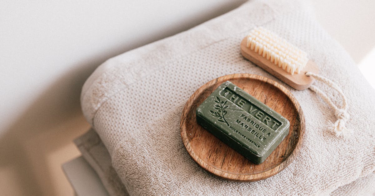 Drying fresh produce after washing - Natural soap and brush on folded towels