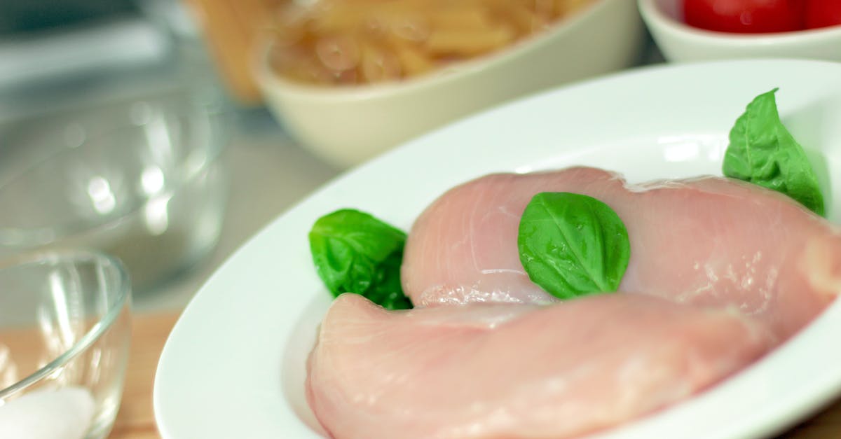 Easy way to trim raw chicken thighs - Fresh Meat on Plate