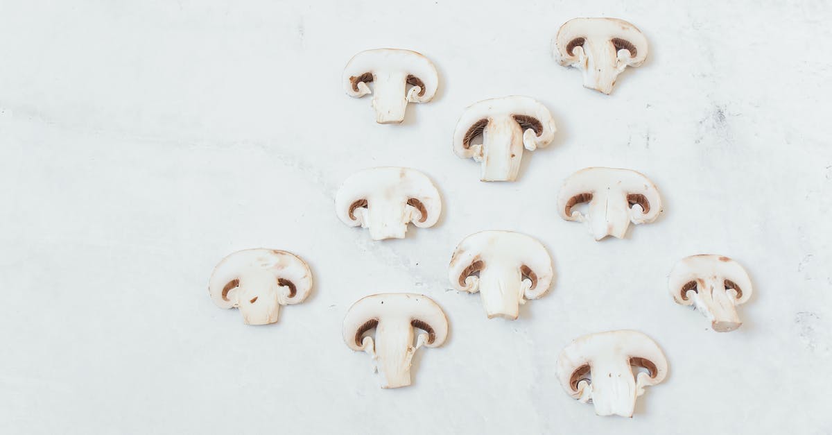 Edible Mushrooms [closed] - Sliced Mushrooms on White Surface