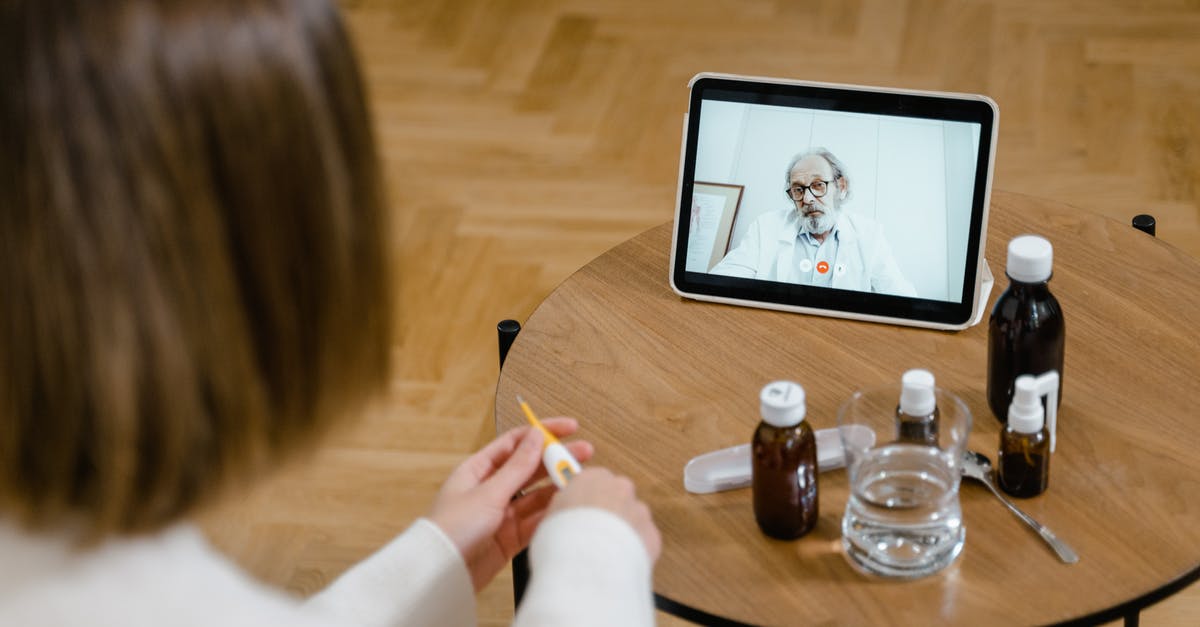 Effects of making smoothies in advance - Woman in White Long Sleeve Shirt Holding Yellow Pencil